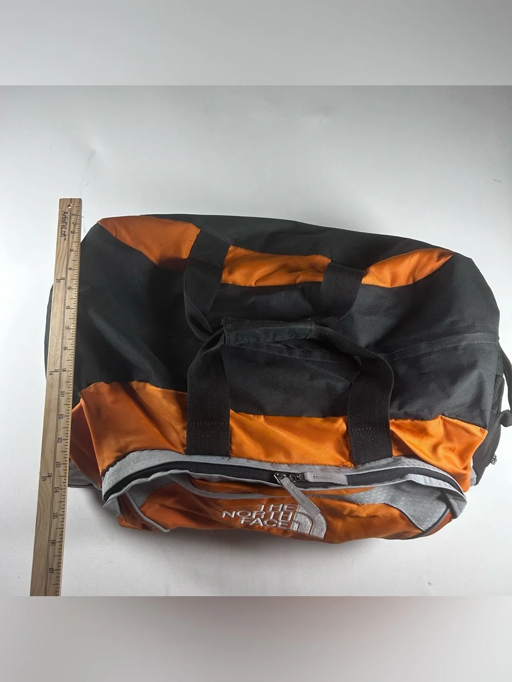 The North Face Rolling Thunder 26” Wheeled Carry On Duffle Bag Orange Silver